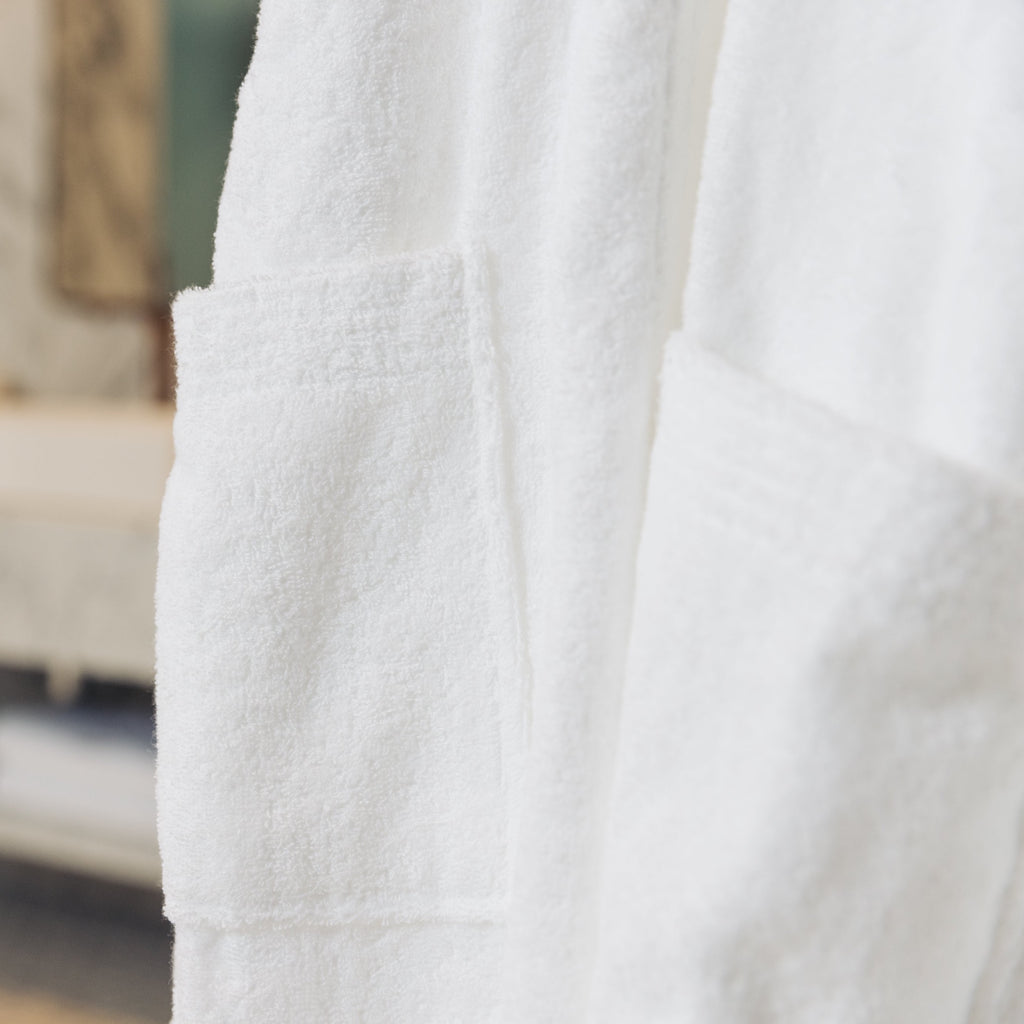 Close photo of the pocket that is featured on Loch Lomond Linen's luxury long dressing gown for women and men.